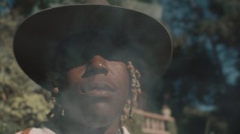 Movie still from “Masego - Mystery Lady” (2021), directed by Douglas Bernardt – Extreme Close Up shot, Low angle