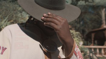 Movie still from “Masego - Mystery Lady” (2021), directed by Douglas Bernardt – Close Up shot, Low angle