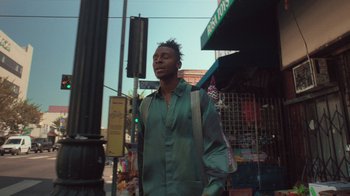 Movie still from “Masego - Mystery Lady” (2021), directed by Douglas Bernardt – Medium shot, Low angle