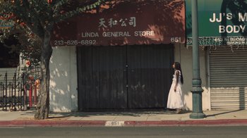 Movie still from “Masego - Mystery Lady” (2021), directed by Douglas Bernardt – Wide shot, Low angle