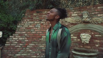 Movie still from “Masego - Mystery Lady” (2021), directed by Douglas Bernardt – Medium shot, Low angle