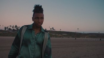 Movie still from “Masego - Mystery Lady” (2021), directed by Douglas Bernardt – Medium shot, Low angle