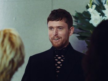 Movie still from “James Blake - Say What You Will” (2021), directed by Bear Damen – Close Up shot, Over the shoulder angle