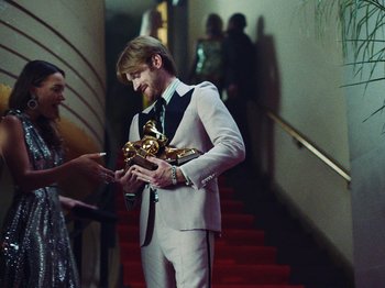 Movie still from “James Blake - Say What You Will” (2021), directed by Bear Damen – Medium shot, Low angle