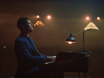 Movie still from “James Blake - Say What You Will” (2021), directed by Bear Damen – Medium shot, Low angle