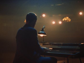 Movie still from “James Blake - Say What You Will” (2021), directed by Bear Damen – Wide shot, Low angle
