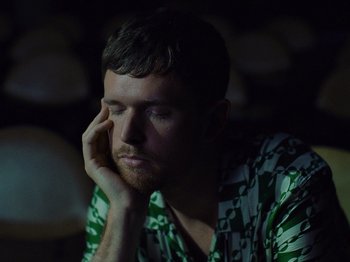 Movie still from “James Blake - Say What You Will” (2021), directed by Bear Damen – Close Up shot, High angle