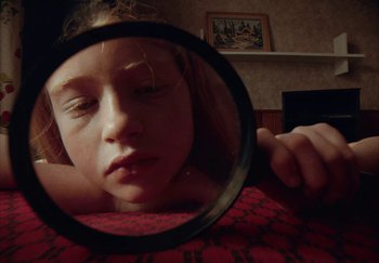 Movie still from “Annet X - Bylo Nebylo” (2021), directed by Jara Moravec – Extreme Close Up shot, High angle