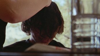 Movie still from “Glaive - Detest Me” (2021), directed by Ramez Silyan – Extreme Close Up shot, Over the shoulder angle