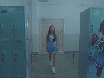 Movie still from “Olivia Rodrigo - good 4 u” (2021), directed by Petra Collins – Wide shot, Low angle