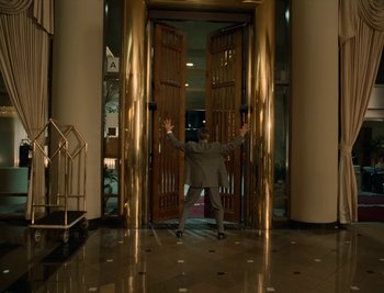 Movie still from “Fatboy Slim - Weapon Of Choice” (2021), directed by Spike Jonze – Wide shot, Low angle