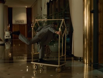 Movie still from “Fatboy Slim - Weapon Of Choice” (2021), directed by Spike Jonze – Wide shot, Low angle
