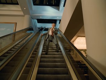 Movie still from “Fatboy Slim - Weapon Of Choice” (2021), directed by Spike Jonze – Wide shot, Low angle