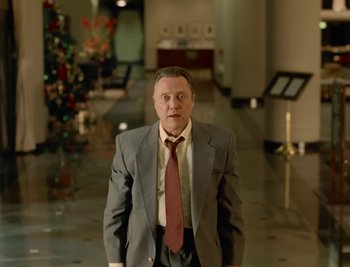 Movie still from “Fatboy Slim - Weapon Of Choice” (2021), directed by Spike Jonze – Medium shot, Low angle