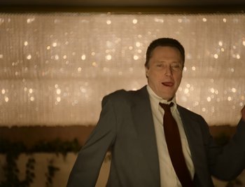 Movie still from “Fatboy Slim - Weapon Of Choice” (2021), directed by Spike Jonze – Medium shot, Low angle