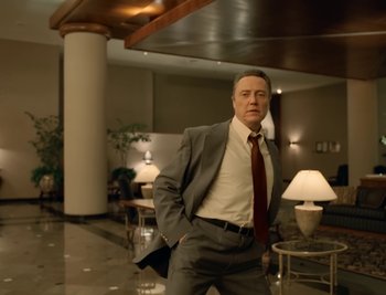 Movie still from “Fatboy Slim - Weapon Of Choice” (2021), directed by Spike Jonze – Medium shot, Low angle