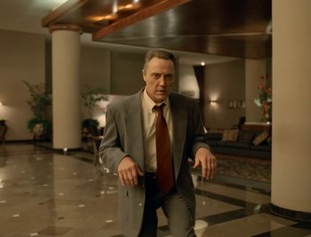 Movie still from “Fatboy Slim - Weapon Of Choice” (2021), directed by Spike Jonze – Medium shot, Low angle