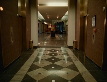 Movie still from “Fatboy Slim - Weapon Of Choice” (2021), directed by Spike Jonze – Extreme Wide shot, High angle