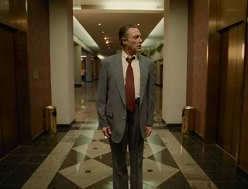 Movie still from “Fatboy Slim - Weapon Of Choice” (2021), directed by Spike Jonze – Medium shot, Low angle