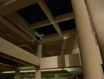 Movie still from “Fatboy Slim - Weapon Of Choice” (2021), directed by Spike Jonze – Extreme Wide shot, Overhead angle