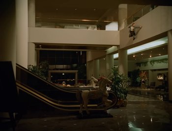 Movie still from “Fatboy Slim - Weapon Of Choice” (2021), directed by Spike Jonze – Extreme Wide shot, Low angle