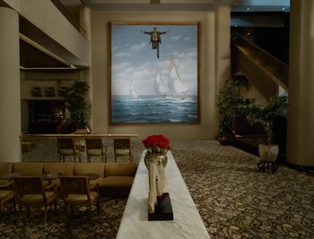 Movie still from “Fatboy Slim - Weapon Of Choice” (2021), directed by Spike Jonze – Extreme Wide shot, Low angle