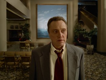 Movie still from “Fatboy Slim - Weapon Of Choice” (2021), directed by Spike Jonze – Medium shot, Low angle