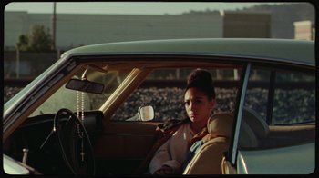 Movie still from “Giveon - Heartbreak Anniversary” (2021), directed by Salomon Ligthelm – Medium shot, Over the shoulder angle