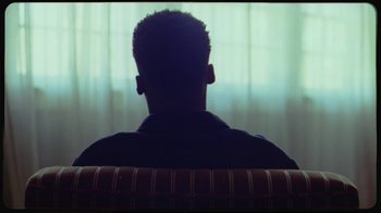 Movie still from “Giveon - Heartbreak Anniversary” (2021), directed by Salomon Ligthelm – Medium shot, Low angle