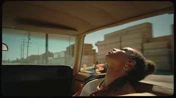 Movie still from “Giveon - Heartbreak Anniversary” (2021), directed by Salomon Ligthelm – Medium shot, Overhead angle