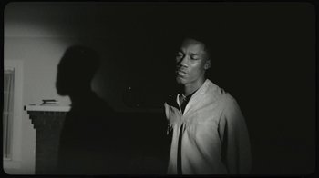 Movie still from “Giveon - Heartbreak Anniversary” (2021), directed by Salomon Ligthelm – Medium shot, Low angle