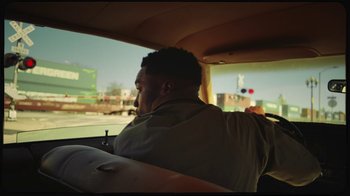 Movie still from “Giveon - Heartbreak Anniversary” (2021), directed by Salomon Ligthelm – Medium shot, Low angle