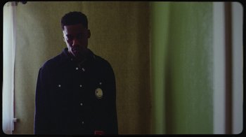 Movie still from “Giveon - Heartbreak Anniversary” (2021), directed by Salomon Ligthelm – Medium shot, Low angle