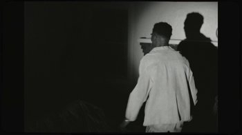 Movie still from “Giveon - Heartbreak Anniversary” (2021), directed by Salomon Ligthelm – Medium shot, Low angle