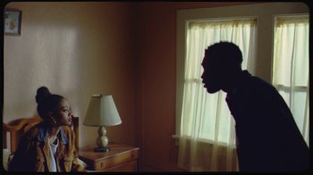 Movie still from “Giveon - Heartbreak Anniversary” (2021), directed by Salomon Ligthelm – Medium shot, Over the shoulder angle