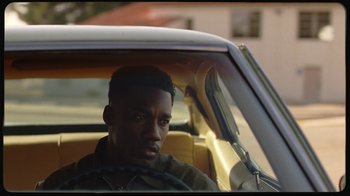 Movie still from “Giveon - Heartbreak Anniversary” (2021), directed by Salomon Ligthelm – Close Up shot, Over the shoulder angle