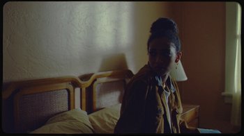 Movie still from “Giveon - Heartbreak Anniversary” (2021), directed by Salomon Ligthelm – Medium shot, Over the shoulder angle