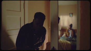 Movie still from “Giveon - Heartbreak Anniversary” (2021), directed by Salomon Ligthelm – Medium shot, Over the shoulder angle