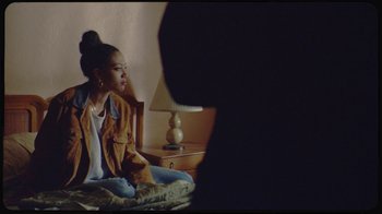 Movie still from “Giveon - Heartbreak Anniversary” (2021), directed by Salomon Ligthelm – Medium shot, Over the shoulder angle