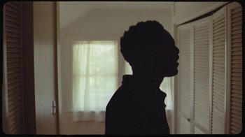 Movie still from “Giveon - Heartbreak Anniversary” (2021), directed by Salomon Ligthelm – Medium shot, Low angle