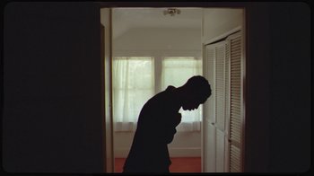 Movie still from “Giveon - Heartbreak Anniversary” (2021), directed by Salomon Ligthelm – Medium shot, Low angle