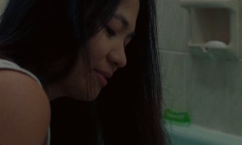 Movie still from “Jordan Klassen - Golden Ladder” (2021), directed by Farhad Ghaderi – Close Up shot, High angle