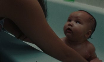 Movie still from “Jordan Klassen - Golden Ladder” (2021), directed by Farhad Ghaderi – Close Up shot, High angle