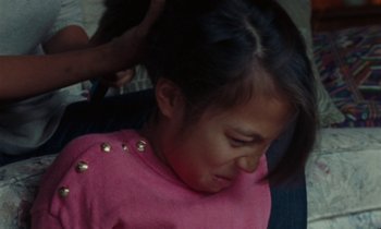 Movie still from “Jordan Klassen - Golden Ladder” (2021), directed by Farhad Ghaderi – Close Up shot, High angle