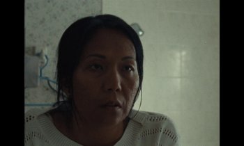 Movie still from “Jordan Klassen - Golden Ladder” (2021), directed by Farhad Ghaderi – Close Up shot, High angle