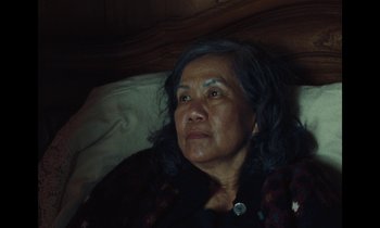 Movie still from “Jordan Klassen - Golden Ladder” (2021), directed by Farhad Ghaderi – Close Up shot, High angle