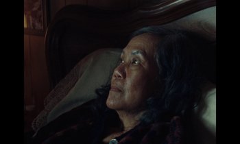 Movie still from “Jordan Klassen - Golden Ladder” (2021), directed by Farhad Ghaderi – Close Up shot, High angle
