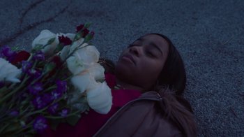 Movie still from “Vic Mensa - Shelter” (2021), directed by Andre Muir – Close Up shot, High angle