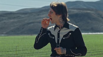 Movie still from “The Neighbourhood - Stargazing” (2021), directed by Ramez Silyan – Medium shot, Low angle