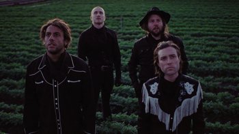 Movie still from “The Neighbourhood - Stargazing” (2021), directed by Ramez Silyan – Medium shot, Low angle